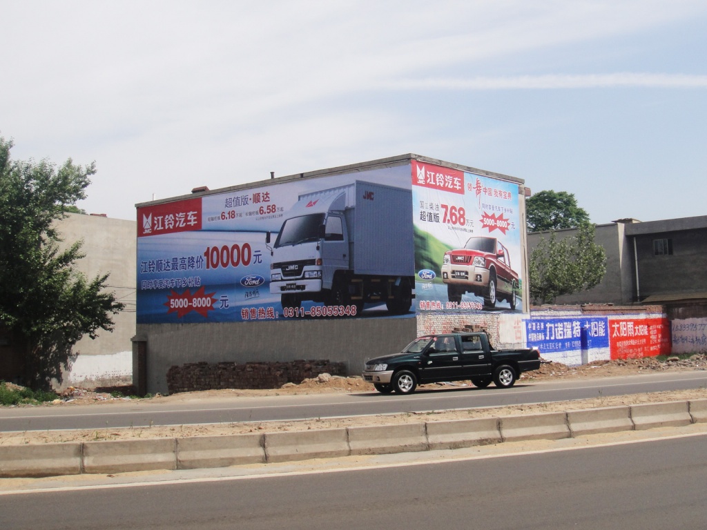 江鈴汽車(chē)噴繪膜廣告